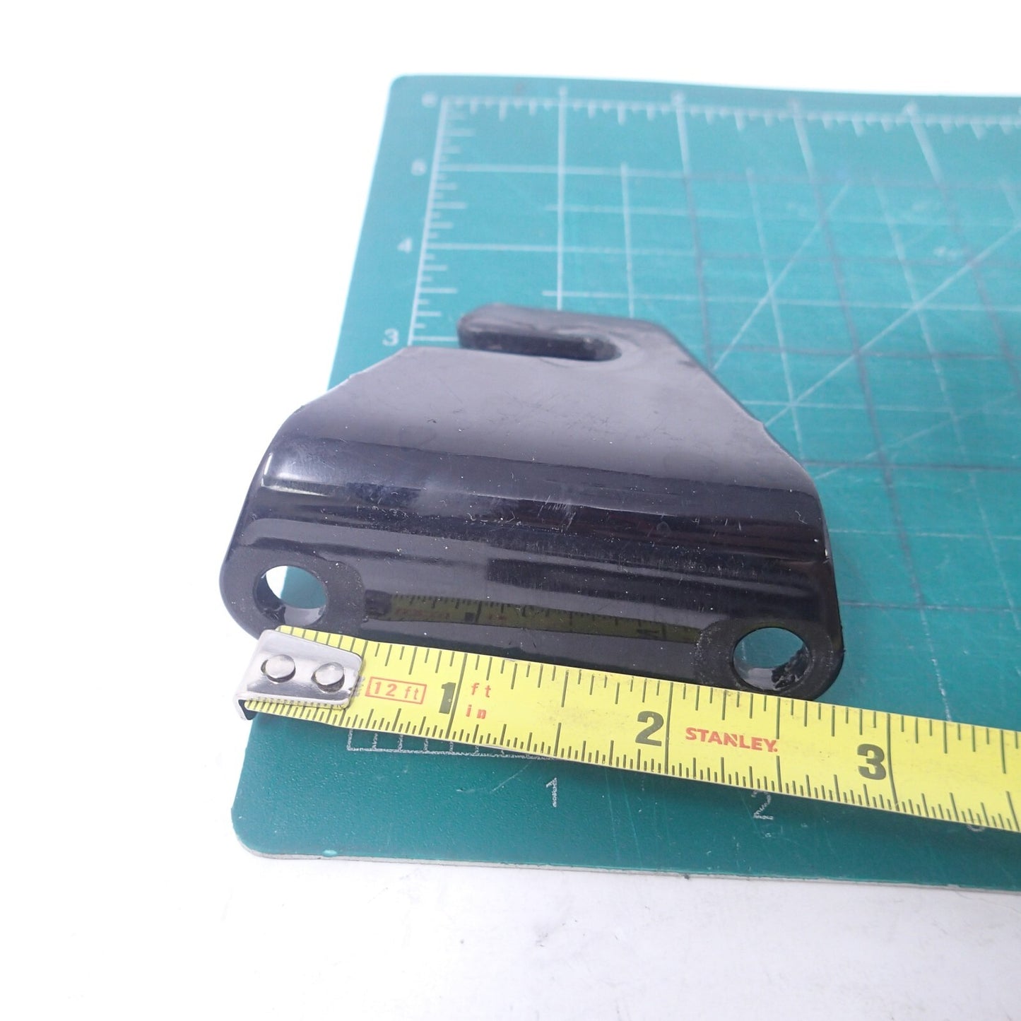 65652-97A FATBOY BRACKET, EXHAUST