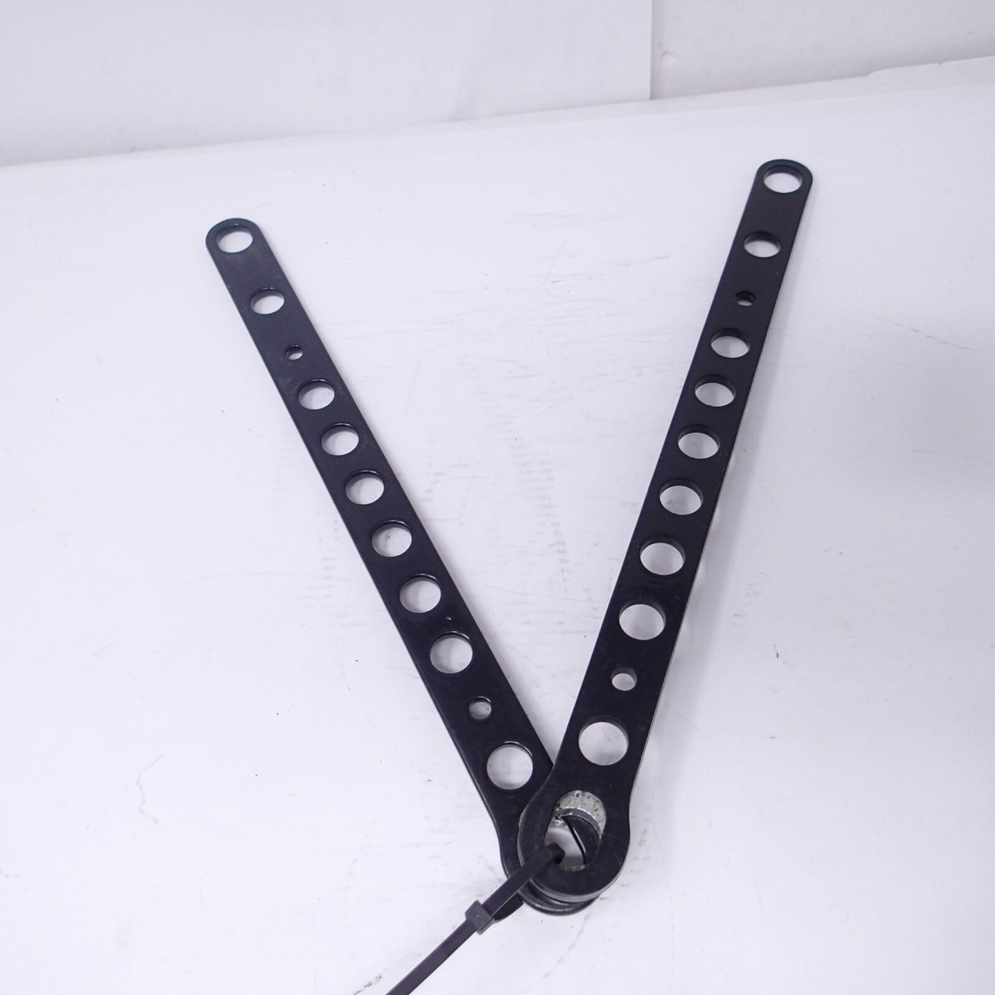 Rear BRACKET, FENDER SPACER Harley Dyna FLD Switchback 57300004