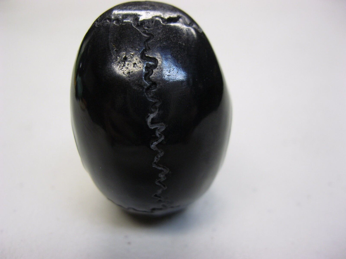 NATURAL WATER BUFFALO HORN HAND CARVED TALL HUMAN SKULL APPROX 2"