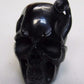 NATURAL WATER BUFFALO HORN HAND CARVED HUMAN SKULL AND SNAKE APPROX 1-1/2"