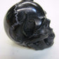NATURAL WATER BUFFALO HORN HAND CARVED HUMAN SKULL AND SNAKE APPROX 1-1/2"
