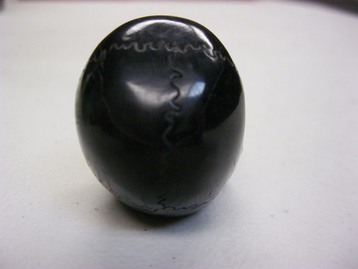 NATURAL WATER BUFFALO HORN HAND CARVED HUMAN SKULL APPROX 1-1/2"