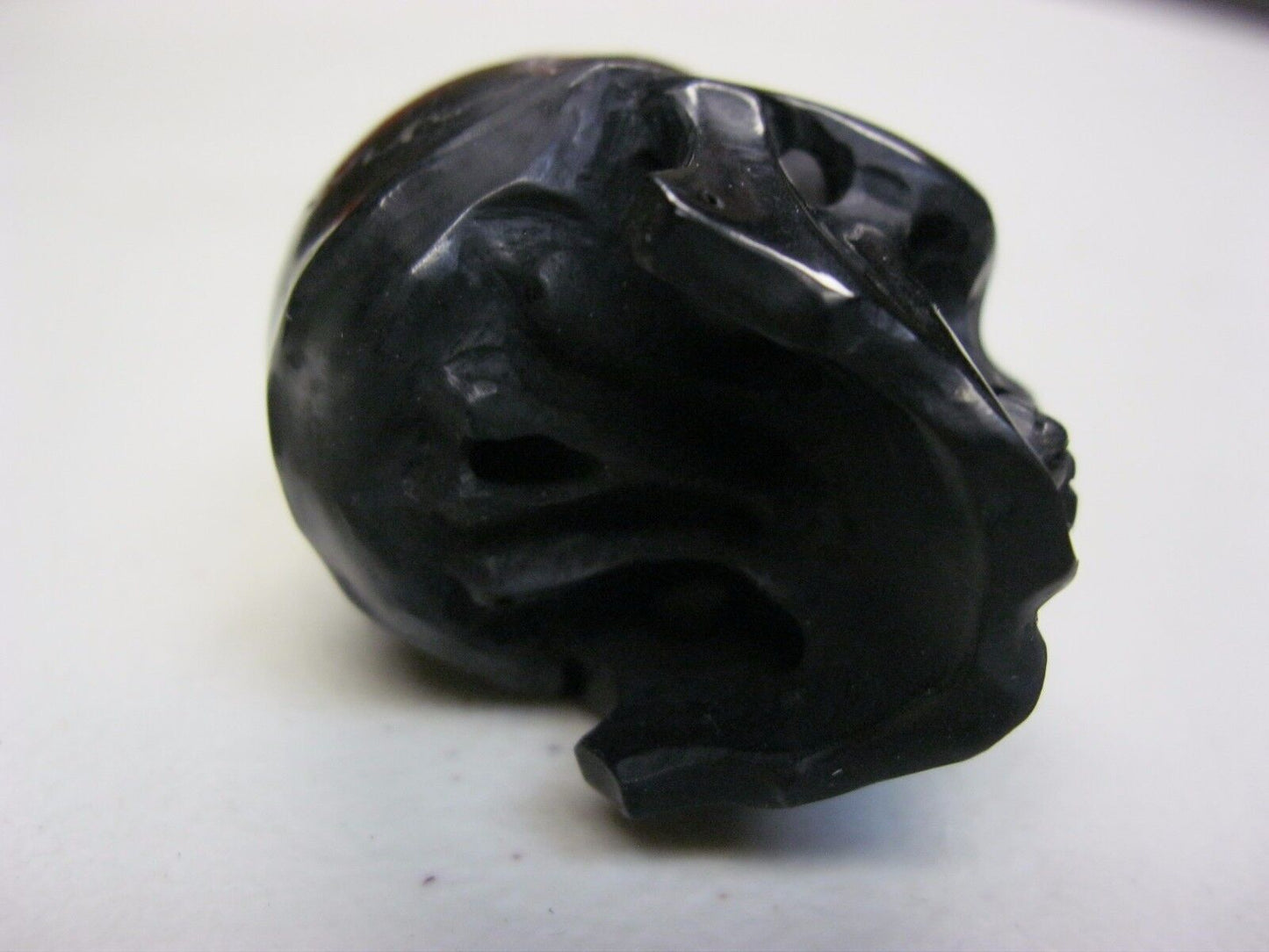 NATURAL WATER BUFFALO HORN HAND CARVED HUMAN SKULL APPROX 1-1/2"