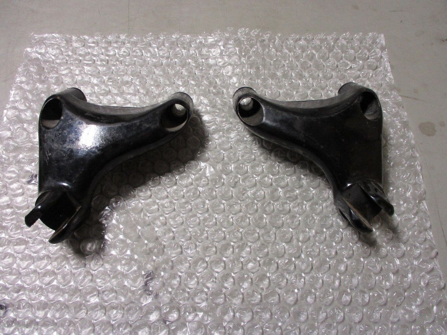 HARLEY-DAVIDSON 04- 14 BLACK XL PASSENGER FOOTREST BRACKETS 49314-04 & 49315-04