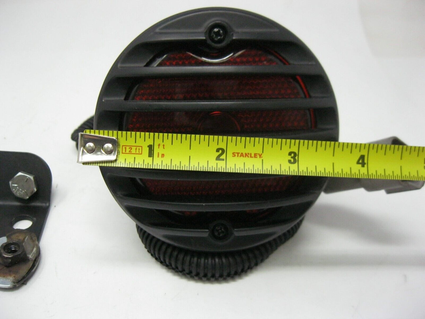 Round Black Finned Style Motorcycle Tail Light for Parts, (Back Broken)