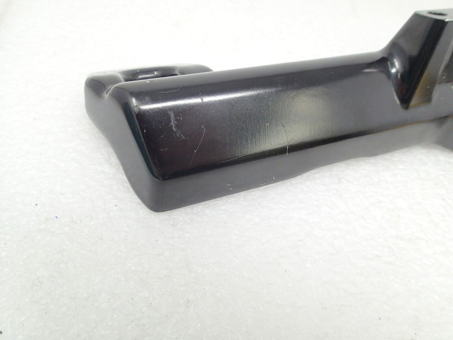 USED HARLEY DAVIDSON 18-22 SOFTAIL BLACK EXHAUST PEG MOUNT BRACKET OEM 65500063