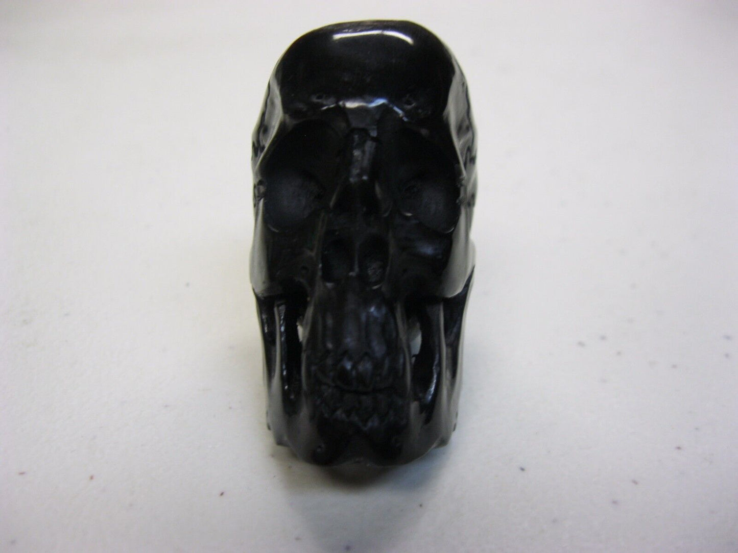 NATURAL WATER BUFFALO HORN HAND CARVED TALL HUMAN SKULL APPROX 2"