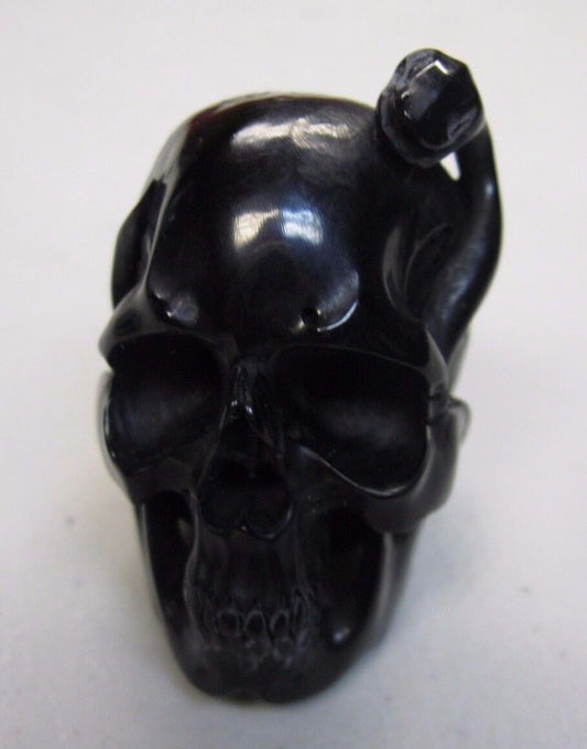 NATURAL WATER BUFFALO HORN HAND CARVED HUMAN SKULL AND SNAKE APPROX 1-1/2"
