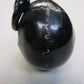 NATURAL WATER BUFFALO HORN HAND CARVED HUMAN SKULL AND SNAKE APPROX 1-1/2"