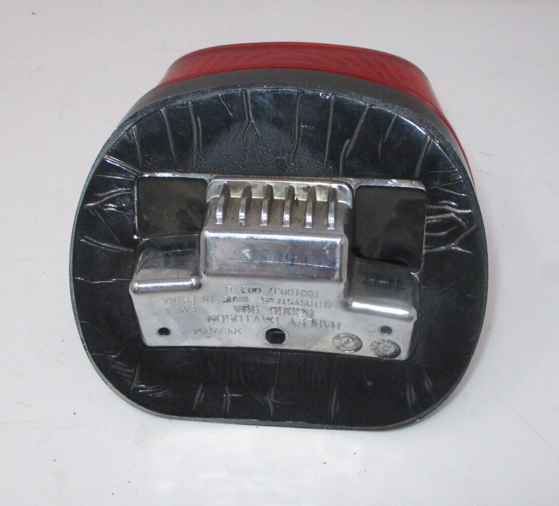 Harley -Davidson  Tail Light Base Assembly with Bulb  68066-99A