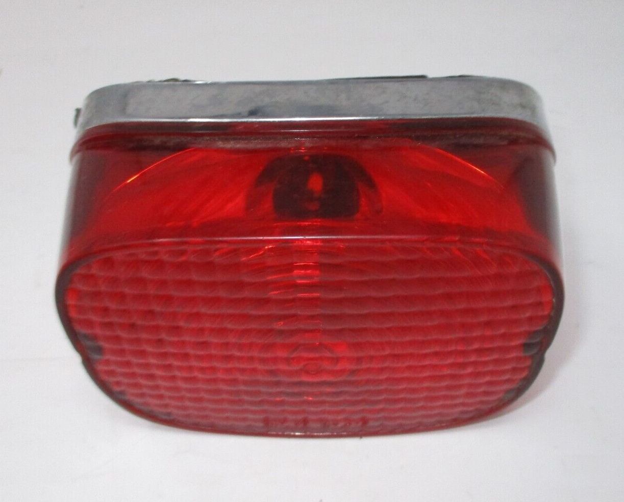 Harley -Davidson  Tail Light Base Assembly  NO BOLB  68066-99A