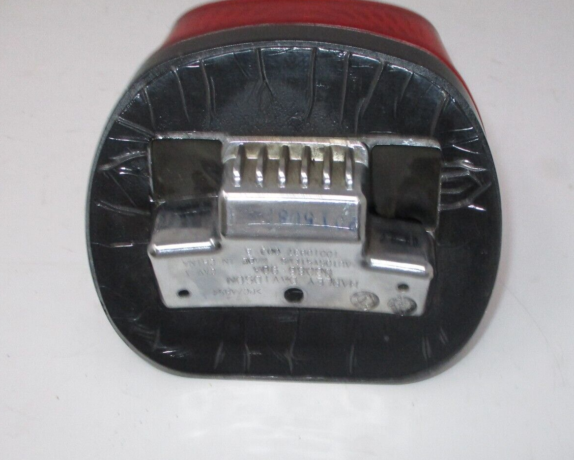 Harley -Davidson  Tail Light Base Assembly with Bulb  68066-99A