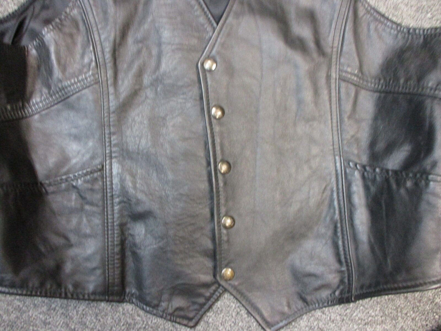 Ladies Size 2 Leather Vest Snap Button Front with two side pockets.